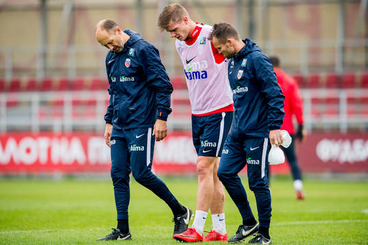 Alexander Sørloth of Norway is helped off the pitch by