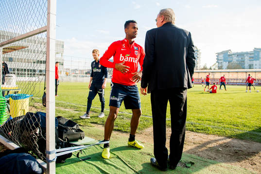 Ola Kamara of Norway talks to Geir Ellefsen, head of