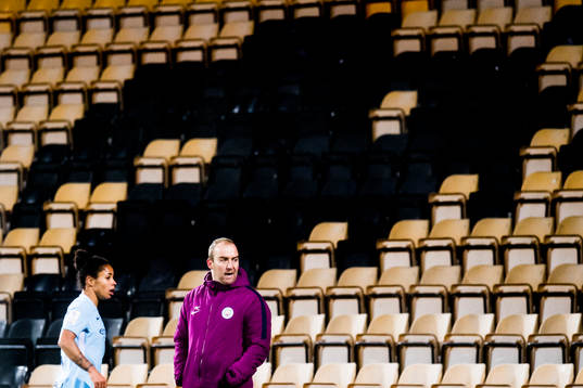 Demi Stokes of Manchester City and Nicholas Cushing, head