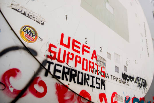 "UEFA supports terrorism" graffiti outside the National