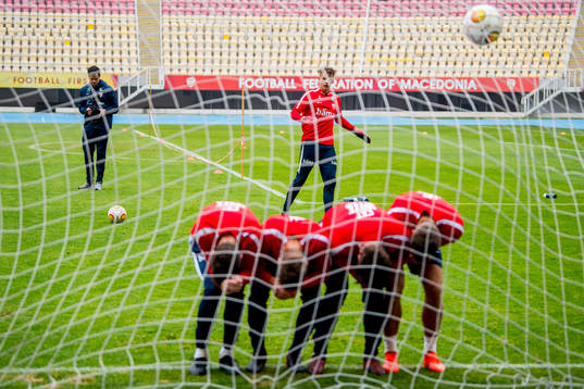 Goalkeeper Ørjan Nyland of Norway shoots toward teammates