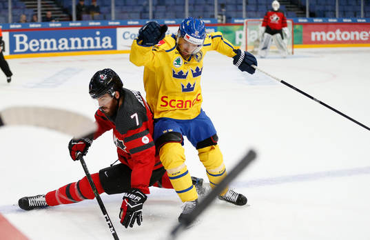 Simon Despres #7, Canada and Fredrik Pettersson #12, Sweden