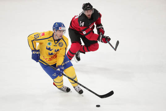Joakim Lindström #10, Sweden and	Brandon Kozun #14, Canada