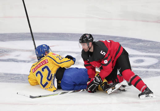 Andre Petersson #22, Sweden and	Chris Lee #5, Canada
