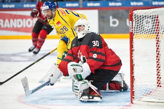 Dick Axelsson #28, Sweden, Ben Scrievens #30, Canada