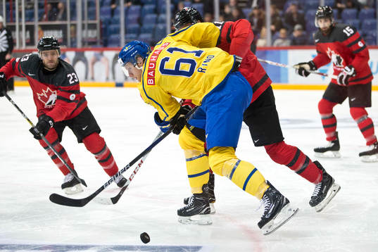 Andrew Ebbett #23, Canada, Johan Ryno #61, Sweden, Jesse