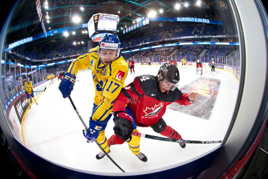 Pär Lindholm #17, Sweden and Charles Genoway #4, Canada