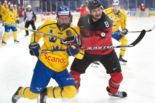 Rasmus Dahlin #26, Sweden and Wojtek Wolski #8, Canada