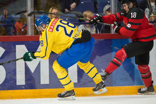 Dick Axelsson #28, Sweden and Linden Vey #18, Canada