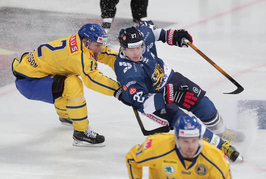 Fredrik Pettersson #12, Sweden and Petri Kontiola #27,