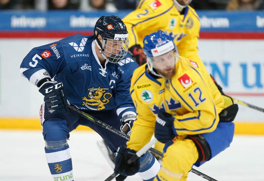 Lasse Kukkonen #5, Finland and Fredrik Pettersson #12,