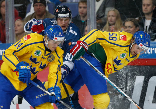 Marcus Högström #14, Sweden, Jarno Koskiranta #40,