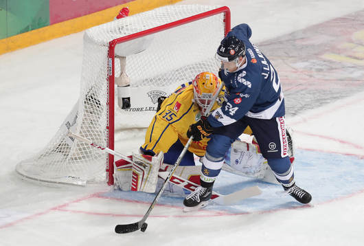 Magnus Helleberg #35, Sweden and	Jani Lajunen #24, Finland