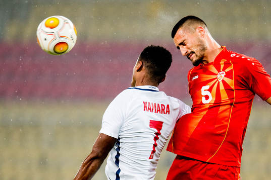 Ola Kamara of Norway and Gjoko Zajkov of Macedonia