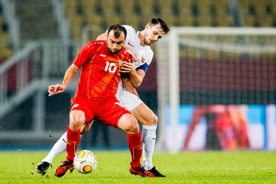 Goran Pandev of Macedonia and Håvard Nordtveit of Norway