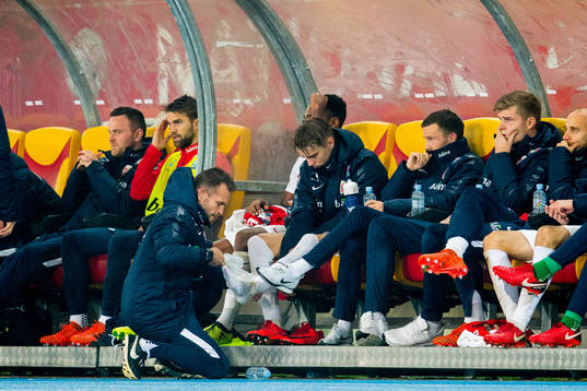 Martin Ødegaard of Norway receives treatment by manual
