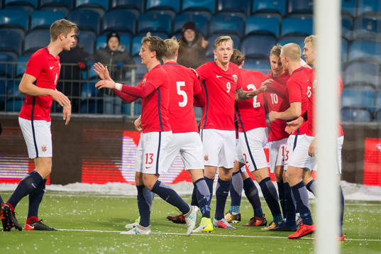 Martin Ødegaard of Norway celebrates with his teammates