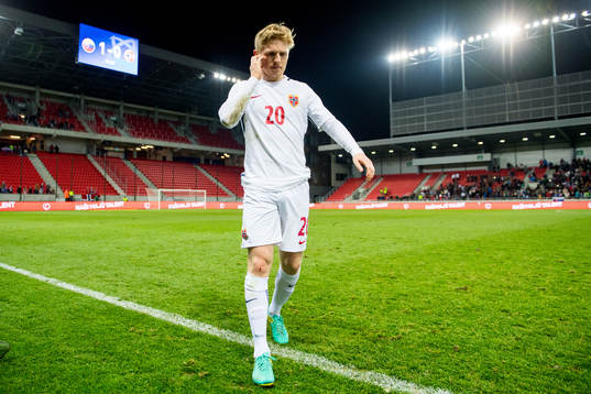 Mats Møller Dæhli of Norway limps off the pitch