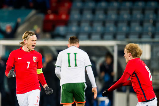 Iver Fossum of Norway celebrates with his teammate Morten