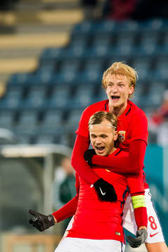 Iver Fossum of Norway celebrates with his teammate Morten