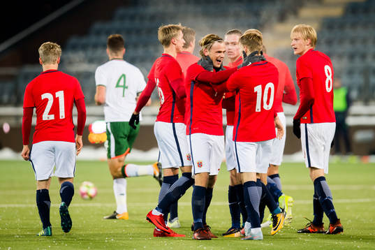 Iver Fossum of Norway celebrates with his teammates