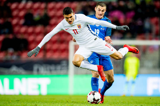Mohamed Elyounoussi of Norway and Matus Bero of Slovakia