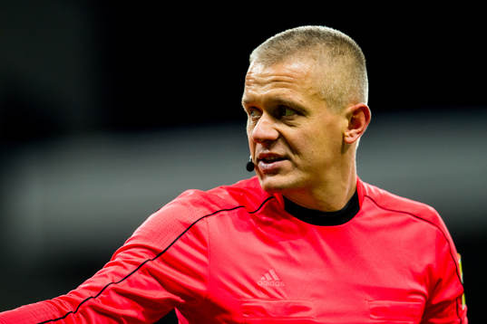 Referee Adam Farkas of Hungary