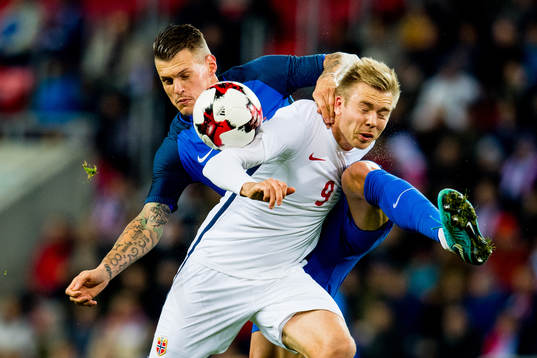 Martin Skrtel of Slovakia and Alexander Toft Søderlund of