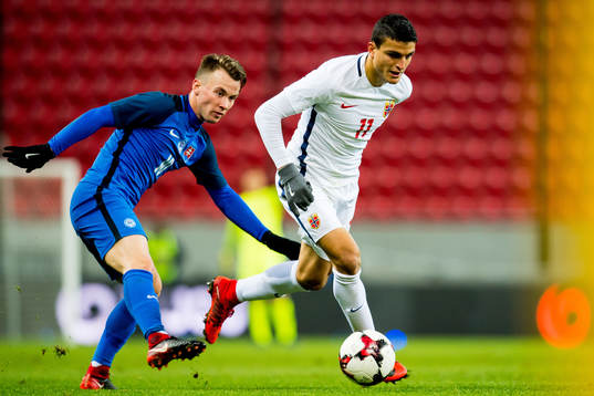 Albert Rusnak of Slovakia and Mohamed Elyounoussi of Norway