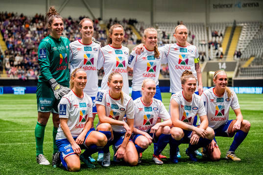 Players of Vålerenga line up for a team photo