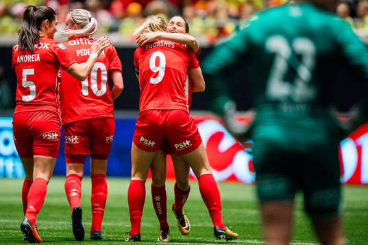 Elise Hove Thorsnes of Avaldsnes celebrates with teammates