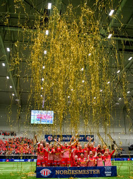 Players of Avaldsnes celebrate winning the cup final match