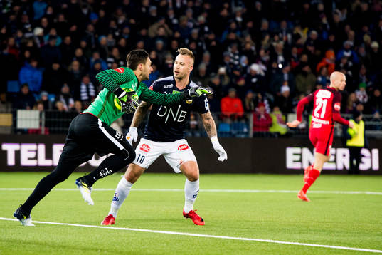 Goalkeeper Piotr Leciejewski of Brann and Marcus Pedersen