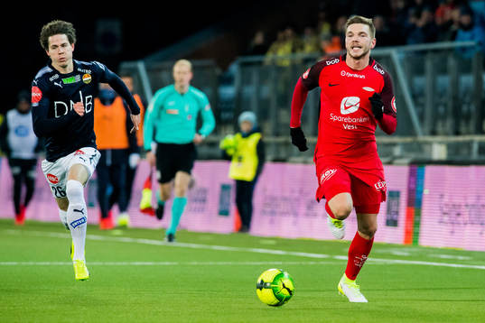 Lars Vilsvik of Strømsgodset and Gilli Rolantsson of Brann