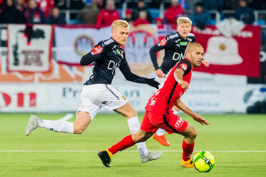 Eirik Ulland Andersen of Strømsgodset and Amin Nouri of