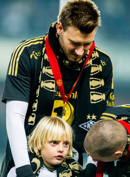 Nicklas Bendtner of Rosenborg together with his son