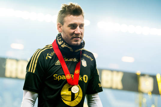Nicklas Bendtner of Rosenborg with the winner's medal