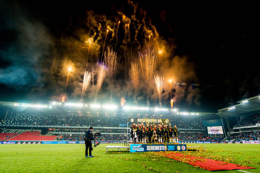 Players of Rosenborg celebrate winning the league
