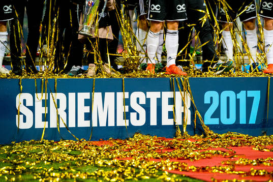 Players of Rosenborg celebrate winning the league