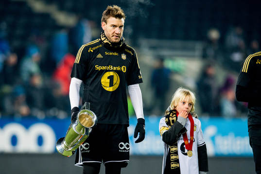 Nicklas Bendtner of Rosenborg celebrates winning the league