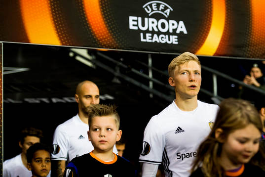 Tore Reginiussen and Birger Meling of Rosenborg enter the