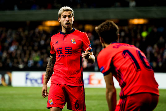 Inigo Martinez and Sergio Canales of Real Sociedad