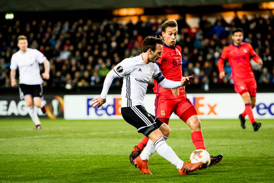 Mike Jensen of Rosenborg and Sergio Canales of Real Sociedad