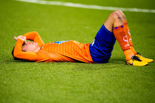Daniel Gretarsson of Aalesund looks dejected being relegated