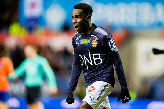 Tokmac Nguen of Strømsgodset celebrates scoring 2-2