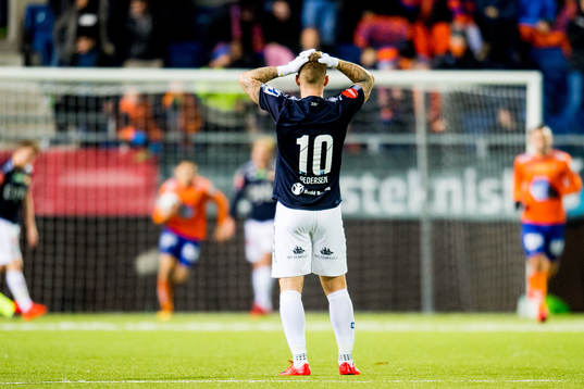 Marcus Pedersen of Strømsgodset looks dejected