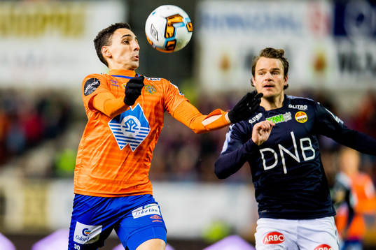 Mustafa «Mos» Abdellaoue of Aalesund and Henning Hauger