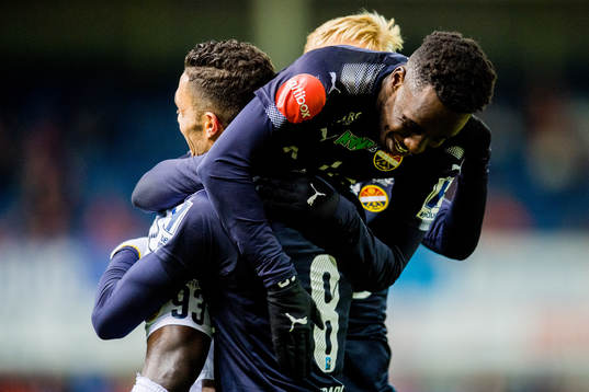 Tokmac Nguen of Strømsgodset celebrates with teammate