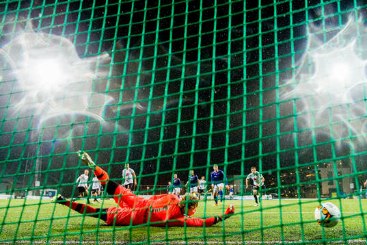 Goalkeeper Mathias Dyngeland of Sogndal sees the ball hit