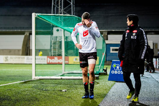 Kjetil Wæhler of Sogndal goes off the pitch with an injury
